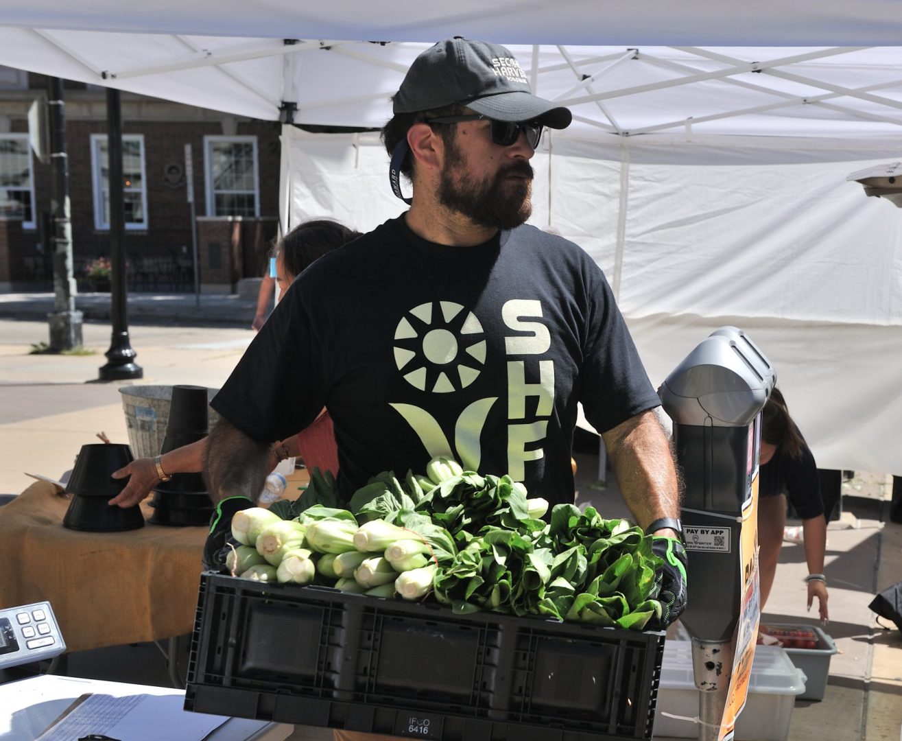 Purchasing produce at Dane County Farmers Market